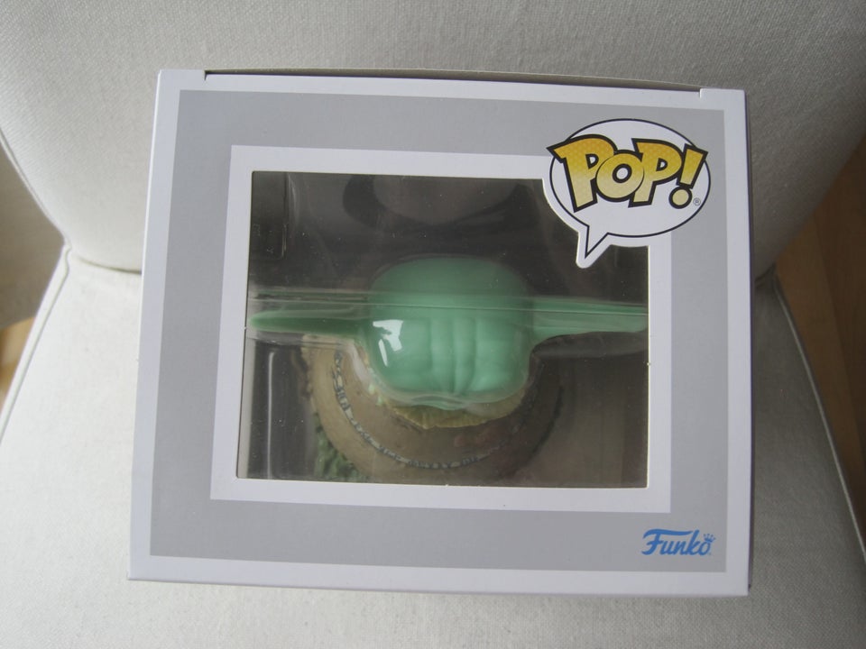 Funko Pop #485 Grogu using the