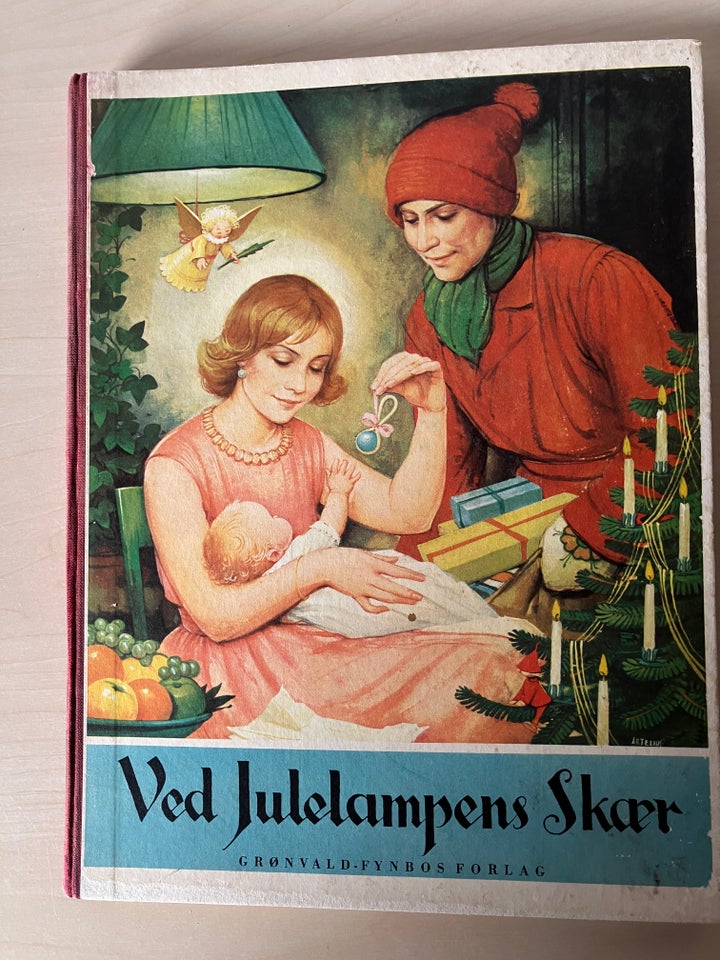 ved Julelampens Skær,