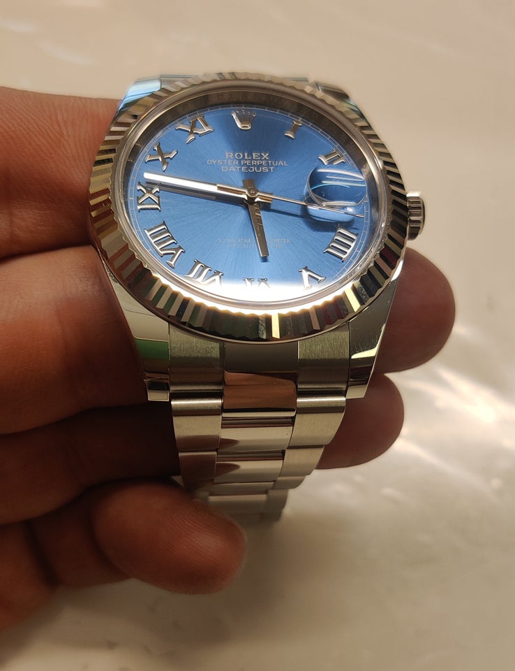 Herreur, Rolex