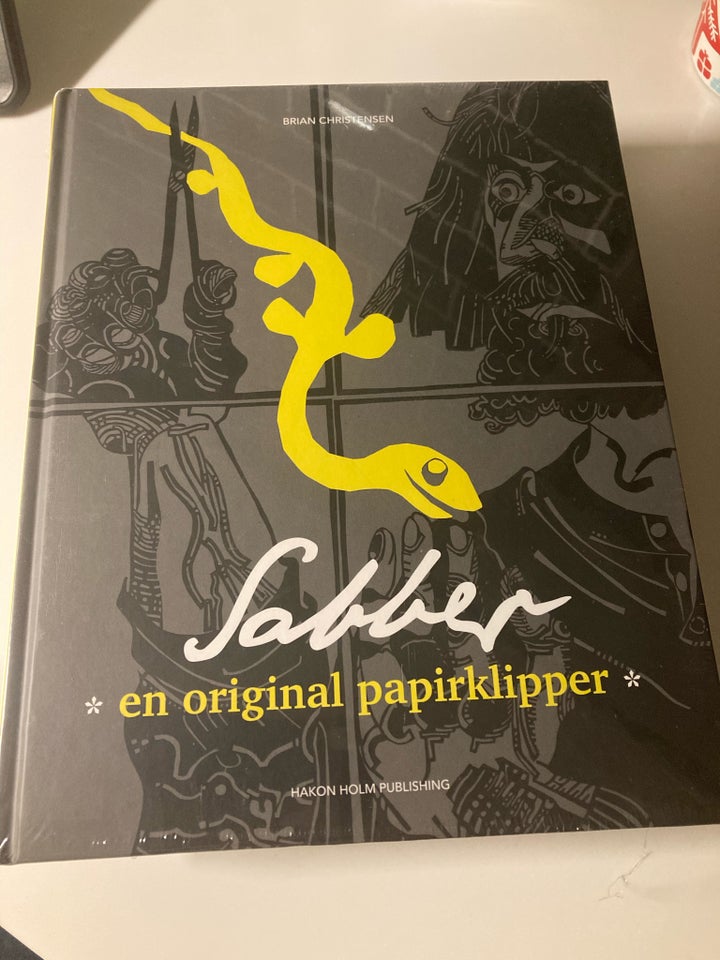 Sabber en original papirklipper,