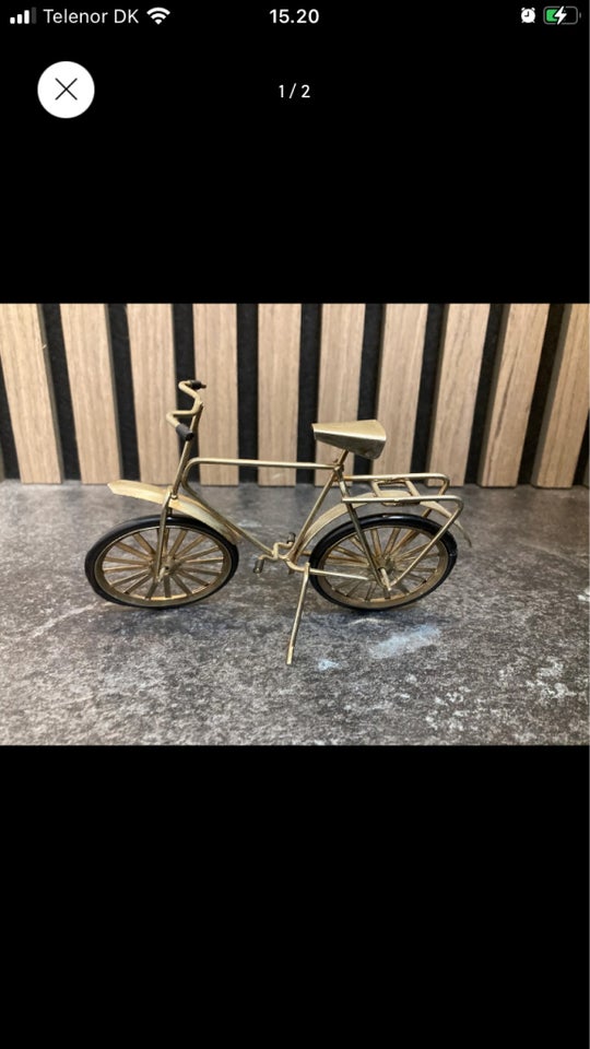 Guldfarvet metalcykel fra 80’erne