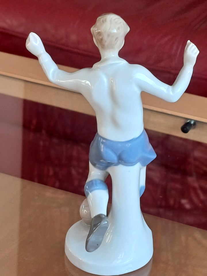 Fodboldspiller figur i porcelæn ,