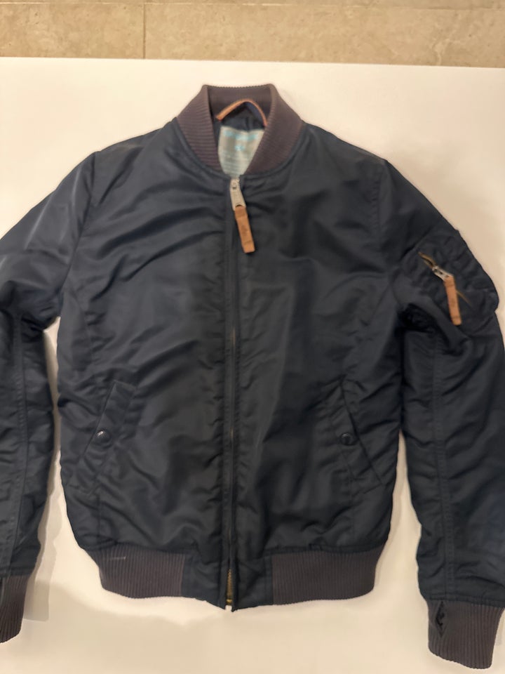 Jakke, Dun, Alpha Industries Inc