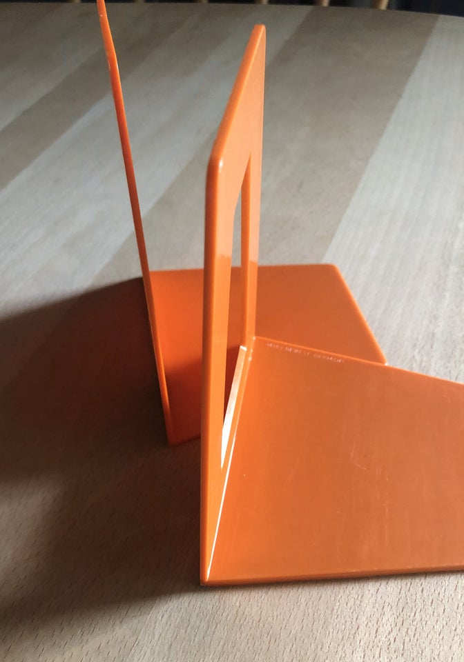 Retro orange bogstøtte i plast,