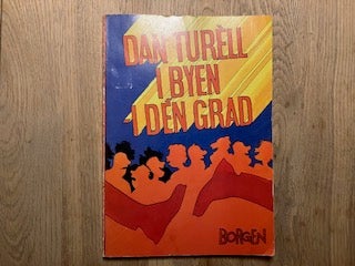 Dan Turéll i byen-I dén grad, Dan