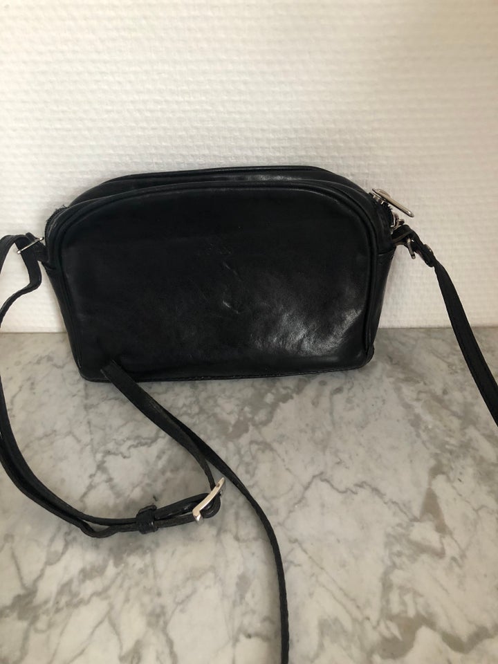 Crossbody Adax skind