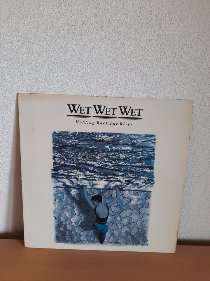 LP Wet Wet Wet Holding back the