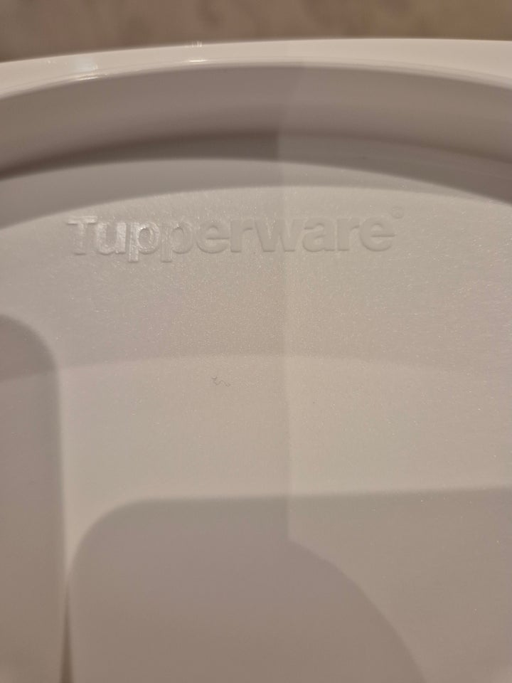 Tupperware osteklokke