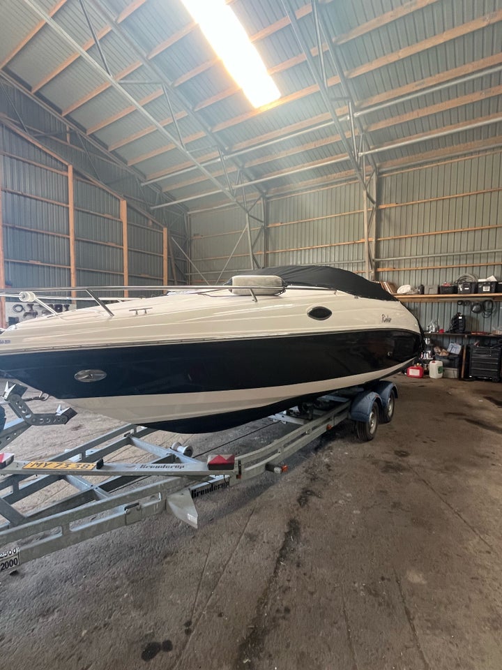 Rinker 232 captiva Cuddy ,