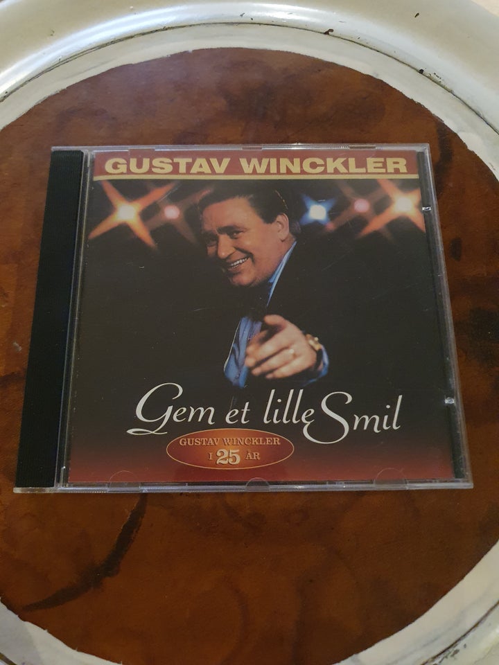 Gustav Winckler: Gem et lille smil,