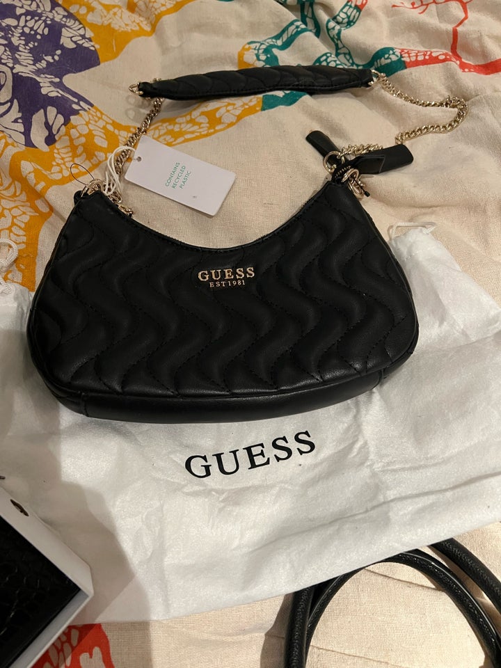 Anden taske, Guess