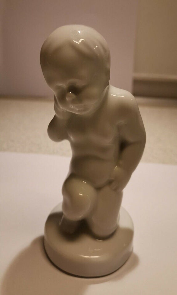 Ørepinen figur i porcelæn