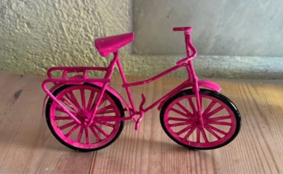 Sjælden pink metalcykel fra