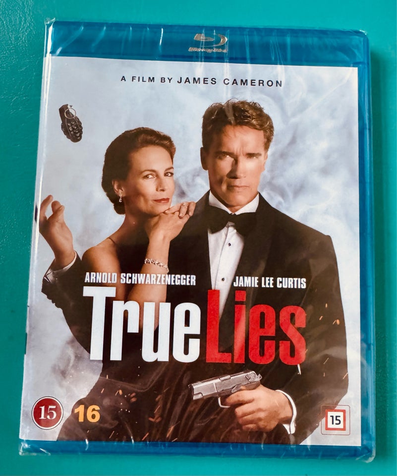 [NY] True Lies/Livsfarlig løgn,