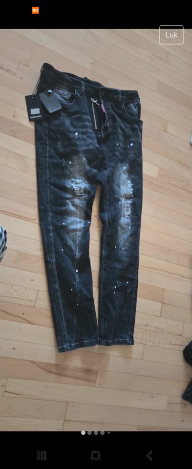 Jeans Dsquared2 str 33