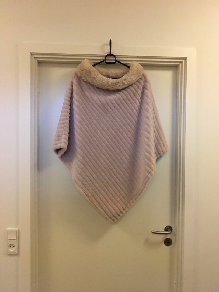 Poncho, Dejlig flot og varm Poncho,