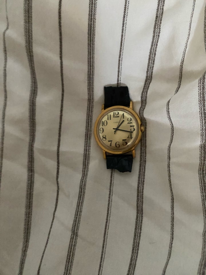 Herreur Timex