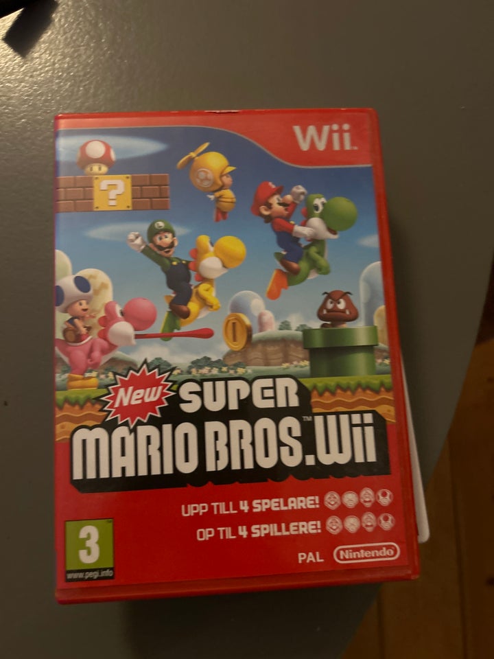 Kasse med WII spil, ret og WII