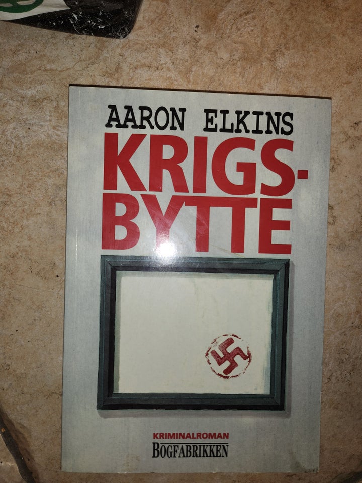 KRIGSBYTTE, Aaron Elkins, emne: