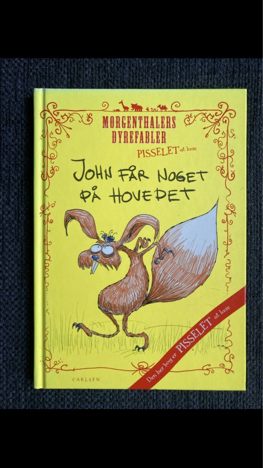 John dår noget på hovedet,