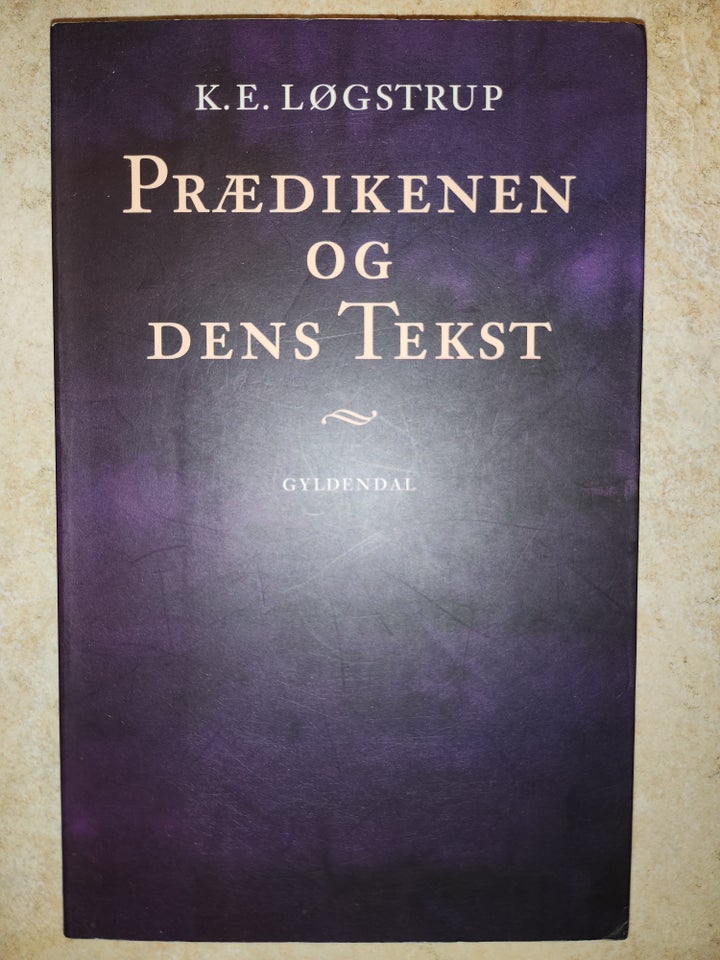 PRÆDIKENEN OG DENS TEKST, K. E.