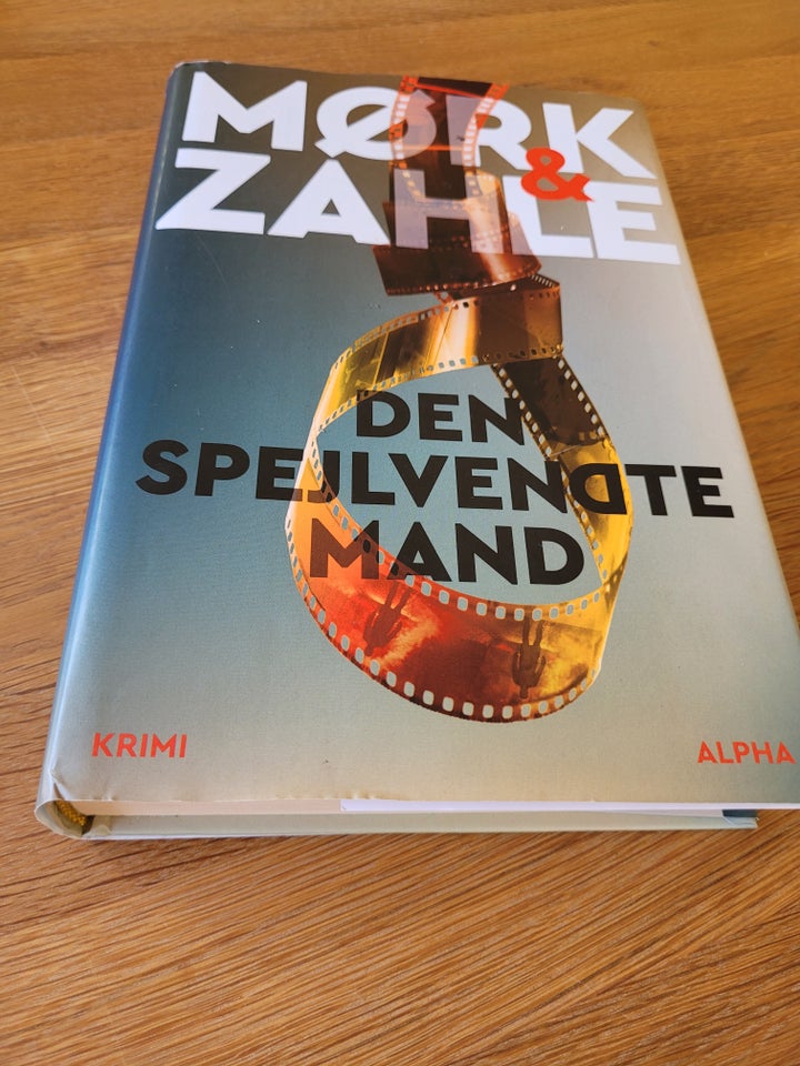 Den spejlvendte mand, Mørk  Zahle,