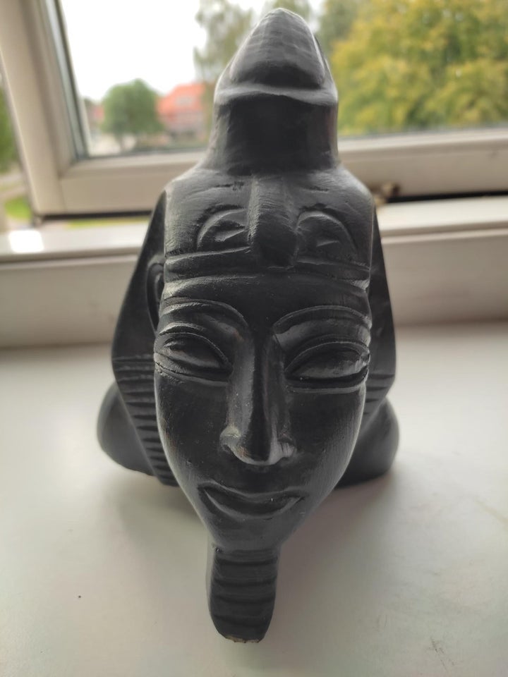 Udskåret stenfigur med egyptisk