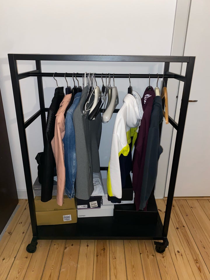 Clothing rack with shelves and