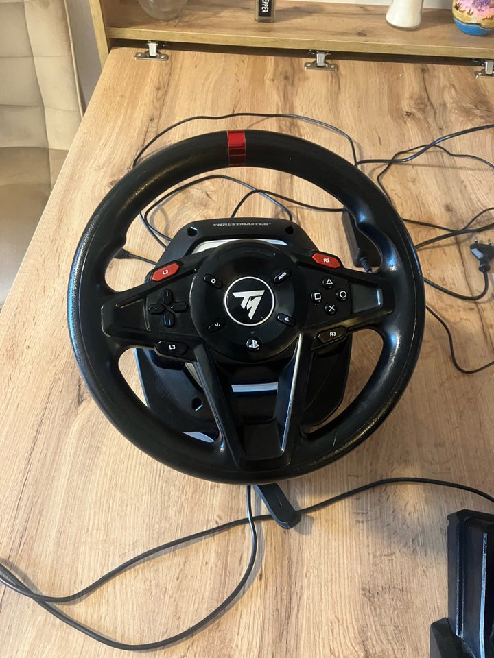 Andet, Thrustmaster, God