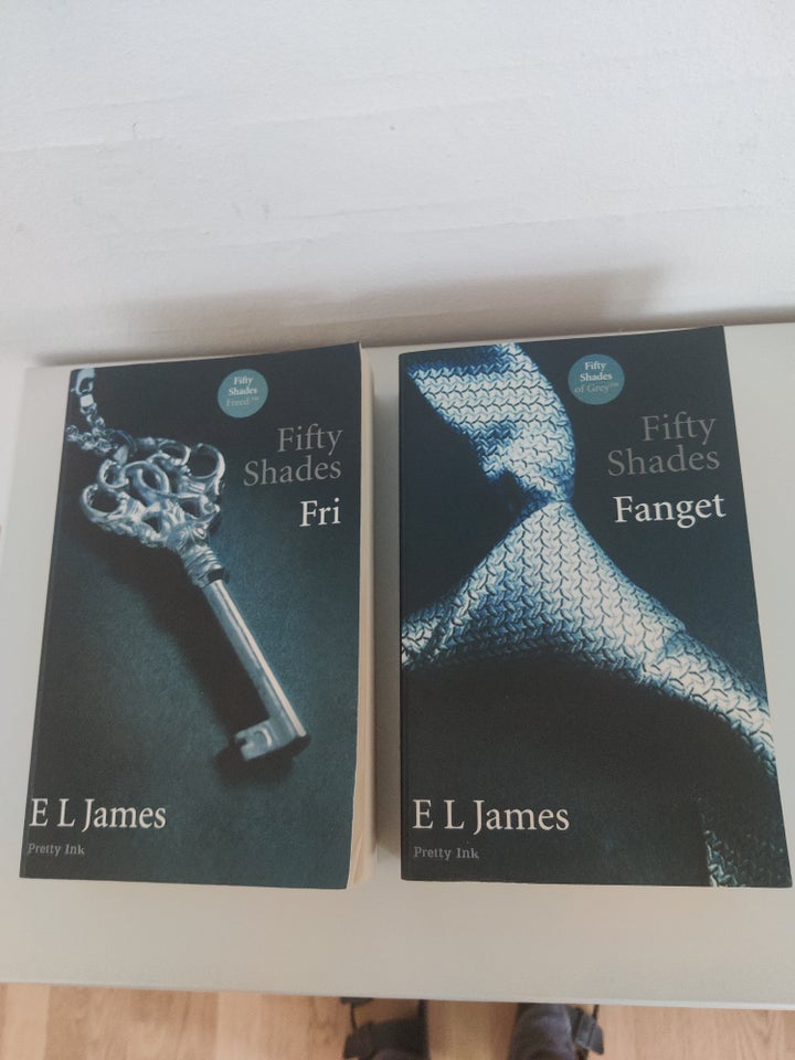 Fanget + Fri, E. L. James, genre: