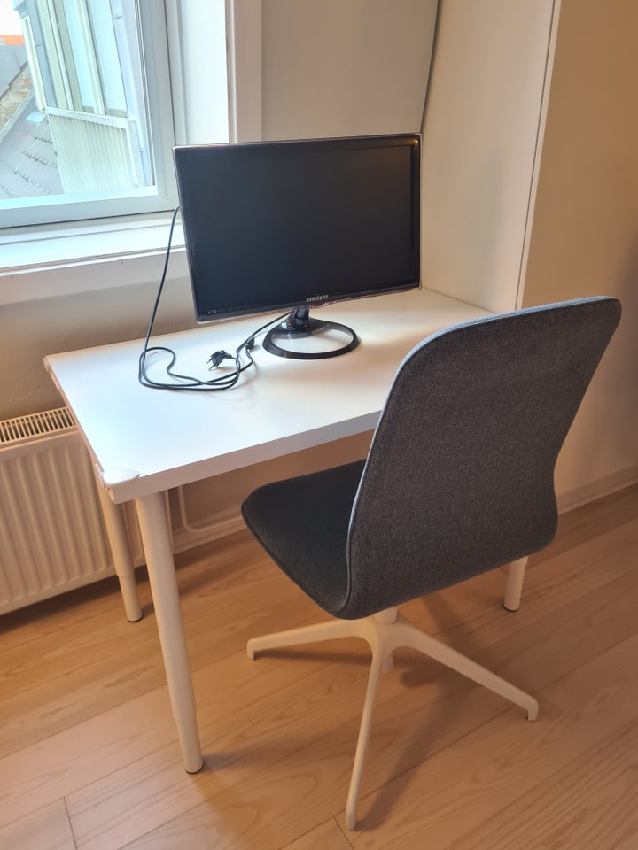 Desk + conference chair + HDTV