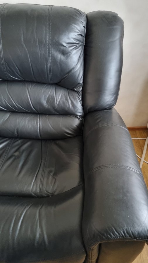 Svart läderrecliner soffa