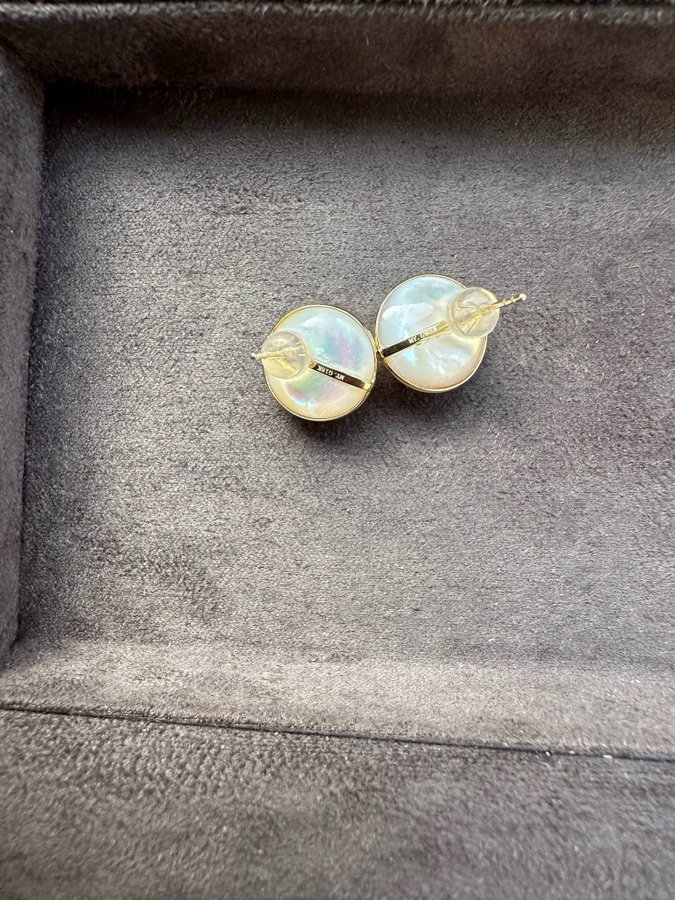 A pair of 18k gold Mabe pearl earrings