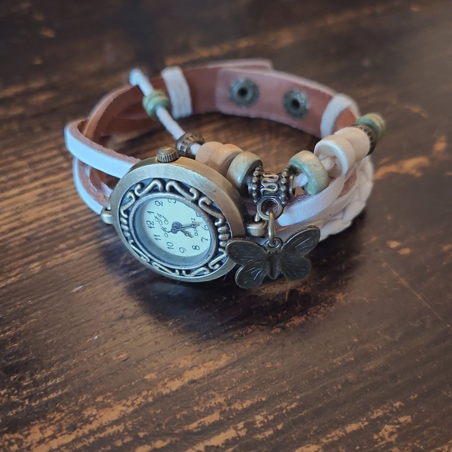 Dekorativ klockarmband vitt