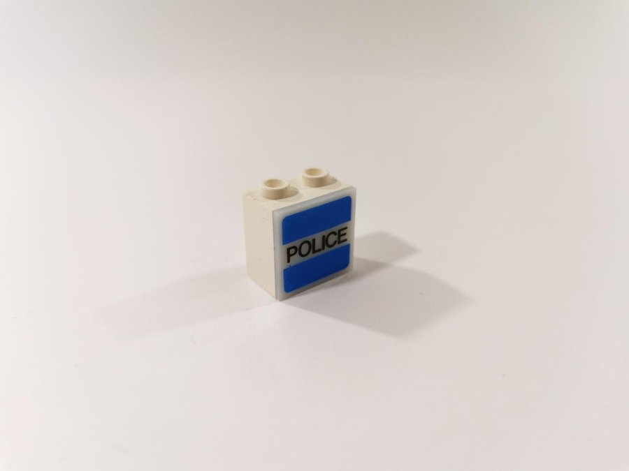 Lego - tryck - bit för belysning - 1x1/8x2x1 2/3 - part 2383 - polis logo