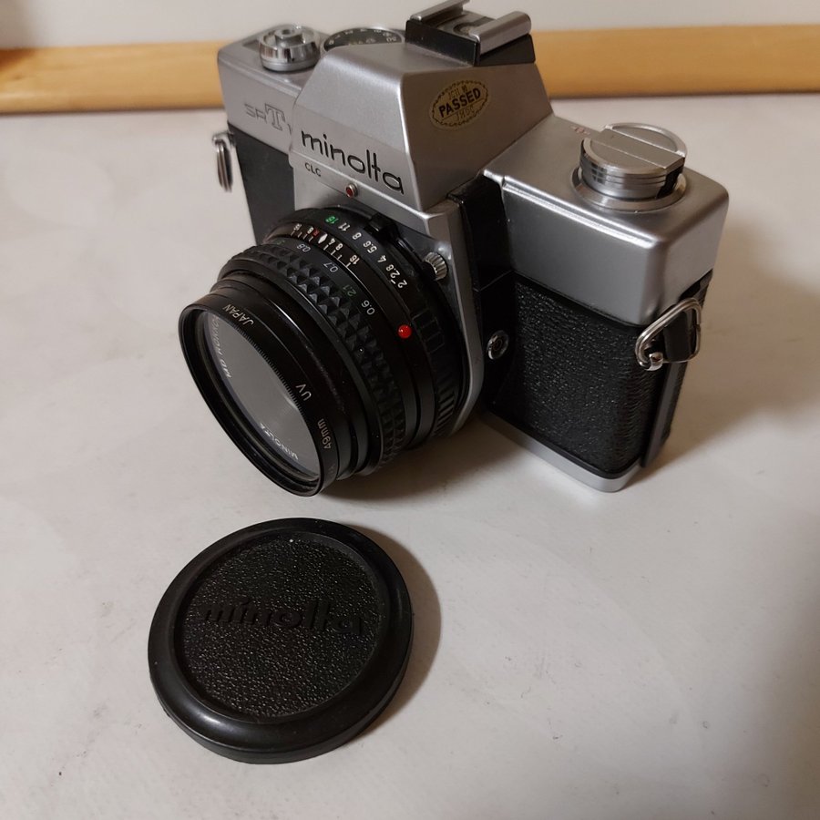 Minolta SRT 100x kamera med objektiv MD Rokkor