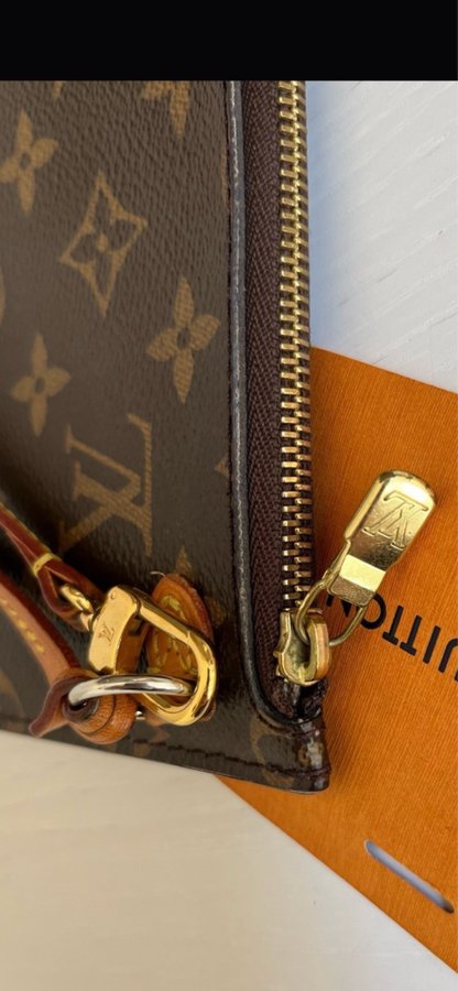 Louis Vuitton monogram clutch