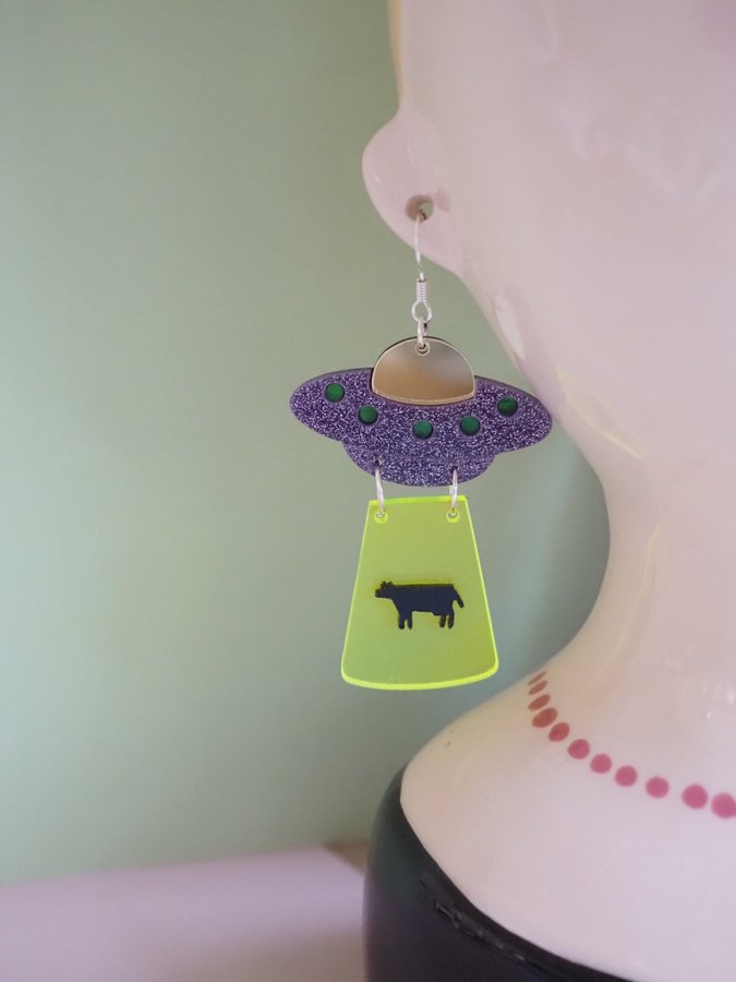 UFO kidnapping cow earrings