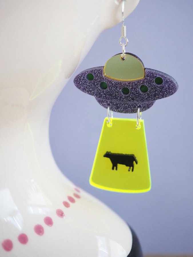 UFO kidnapping cow earrings