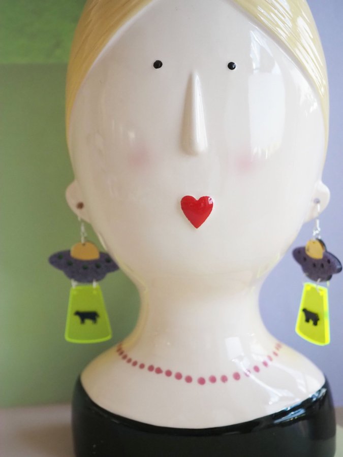 UFO kidnapping cow earrings