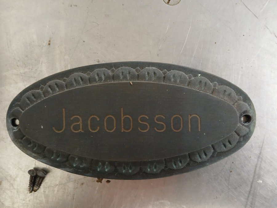 Dörrskylt Jacobsson