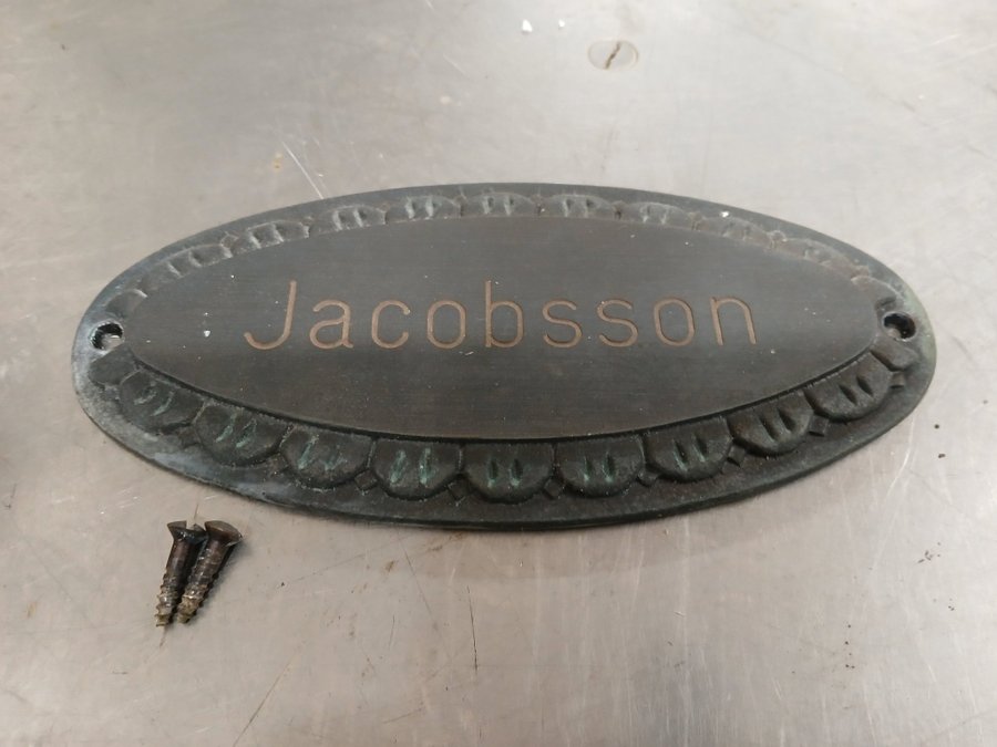 Dörrskylt Jacobsson