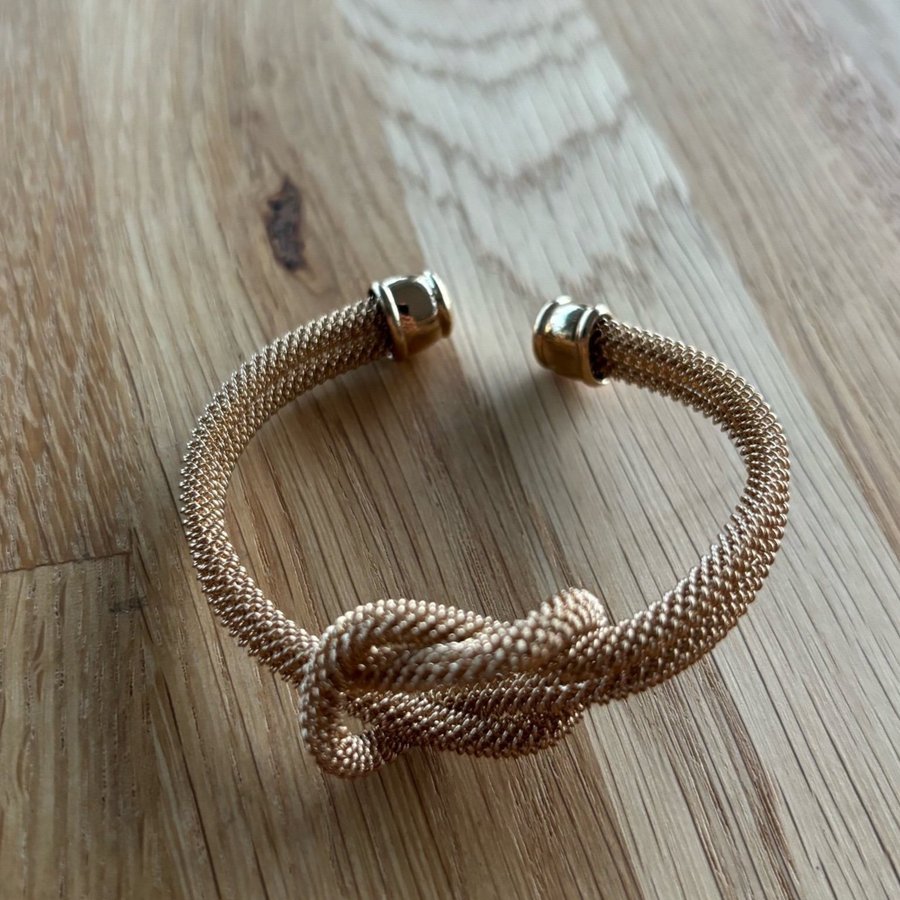 Justerbart armband i guld