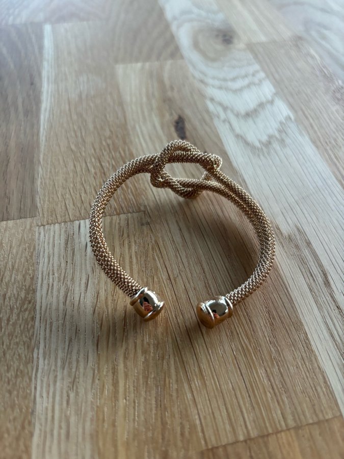 Justerbart armband i guld