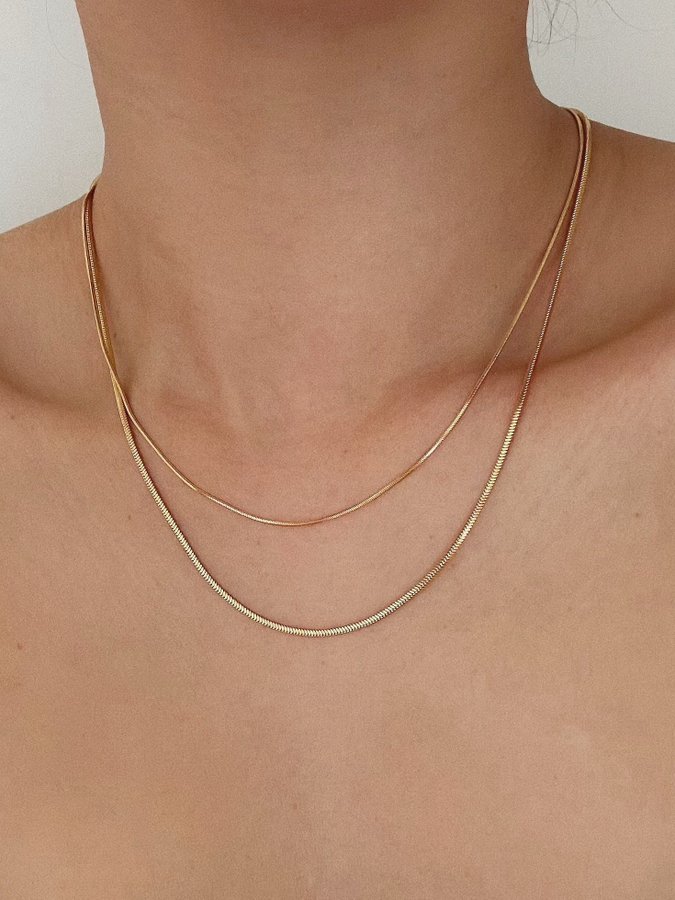 Halsband i stål med 18k guld med ormkedja 1,2mm