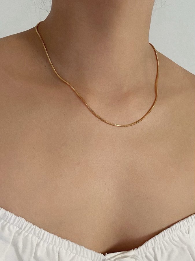 Halsband i stål med 18k guld med ormkedja 1,2mm