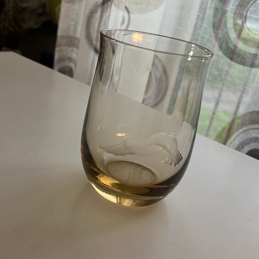 Glas med fågelmotiv