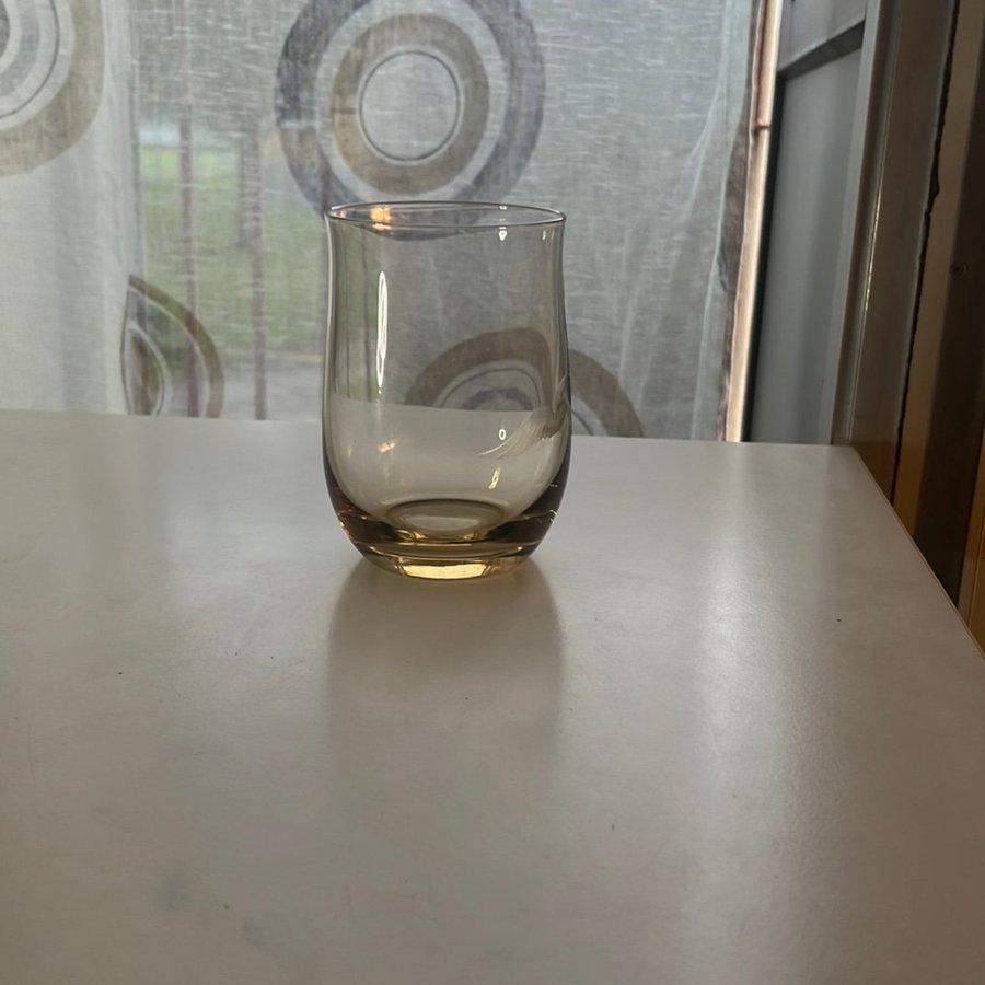 Glas med fågelmotiv