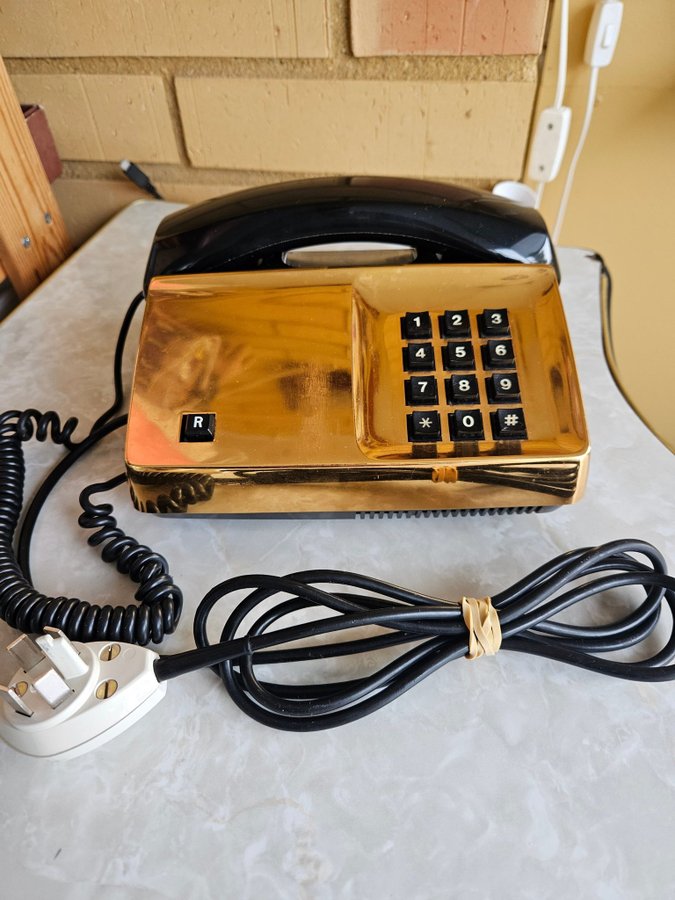 Telefon tidig Diavox i guldfärg 1980-tal