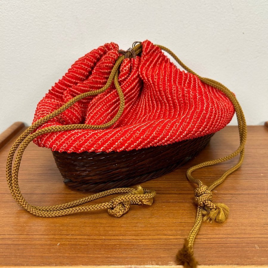 Vintage Japanese silk drawstring bag with woven base